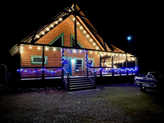 view of back house at night