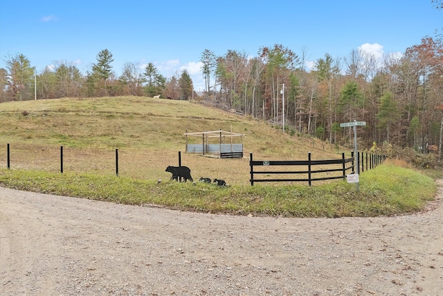 exterior space with a rural view