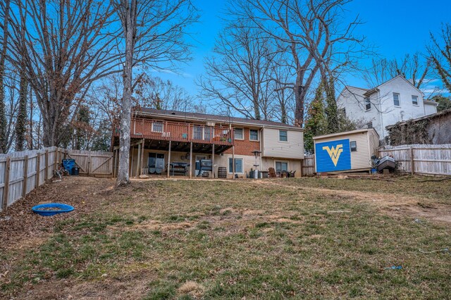 back of house with a wooden deck