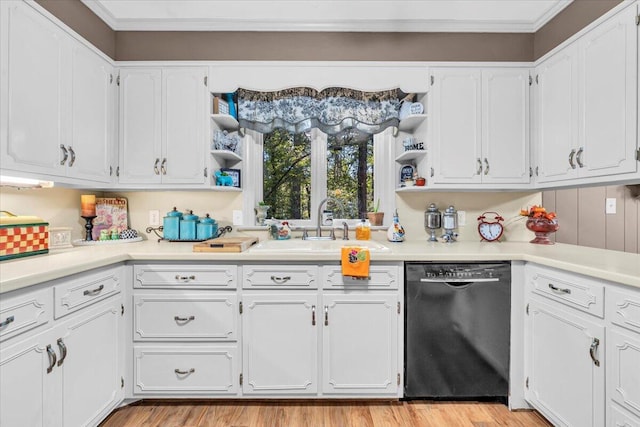 kitchen featuring dishwasher, white cabinets, light hardwood / wood-style flooring, and sink