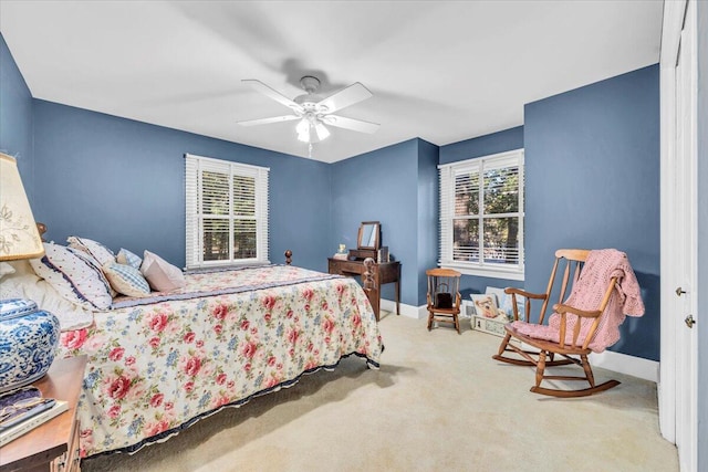 bedroom featuring ceiling fan and carpet floors