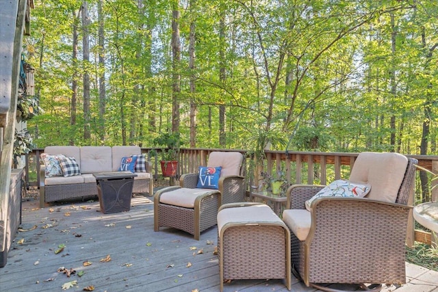 wooden terrace featuring an outdoor hangout area