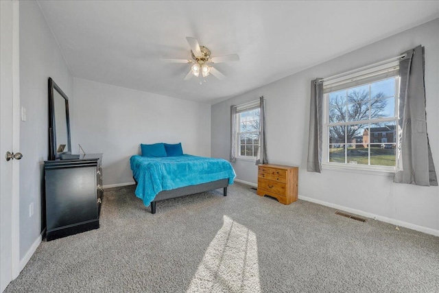 bedroom featuring carpet and ceiling fan