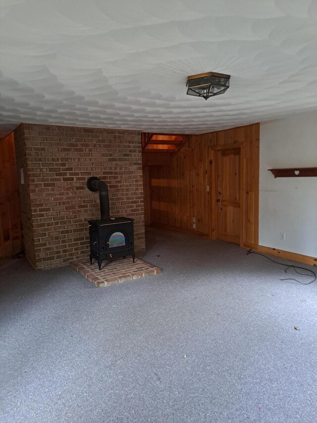 unfurnished bedroom featuring baseboards, carpet flooring, visible vents, and multiple closets