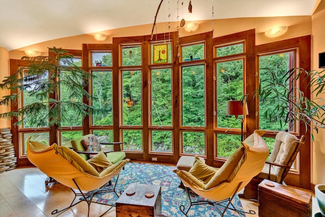 sunroom with lofted ceiling