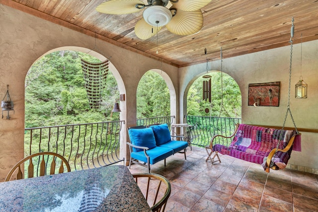 view of patio with an outdoor hangout area, a balcony, and ceiling fan