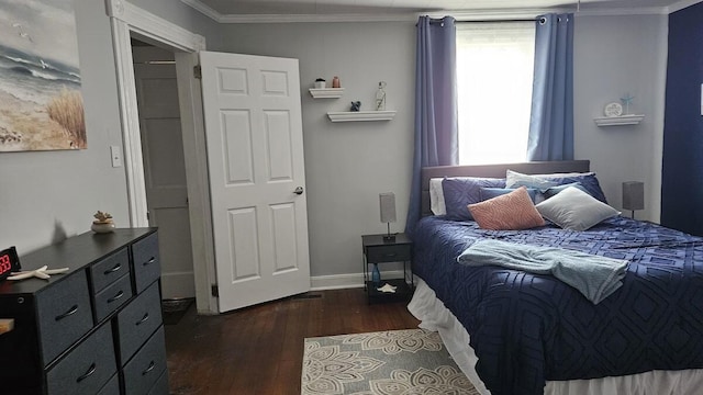 bedroom featuring dark hardwood / wood-style flooring and crown molding