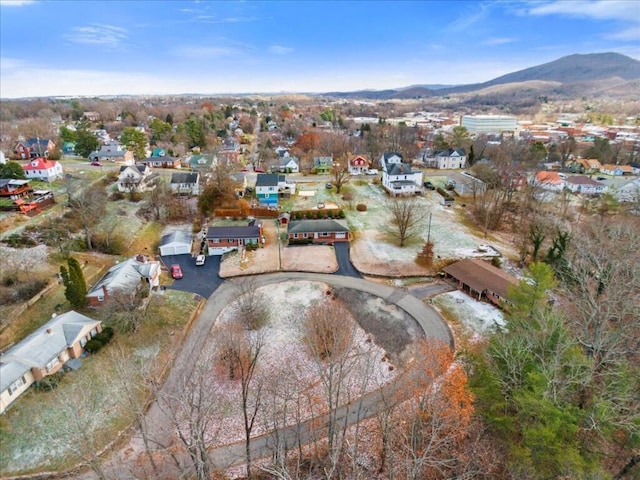 birds eye view of property featuring a mountain view