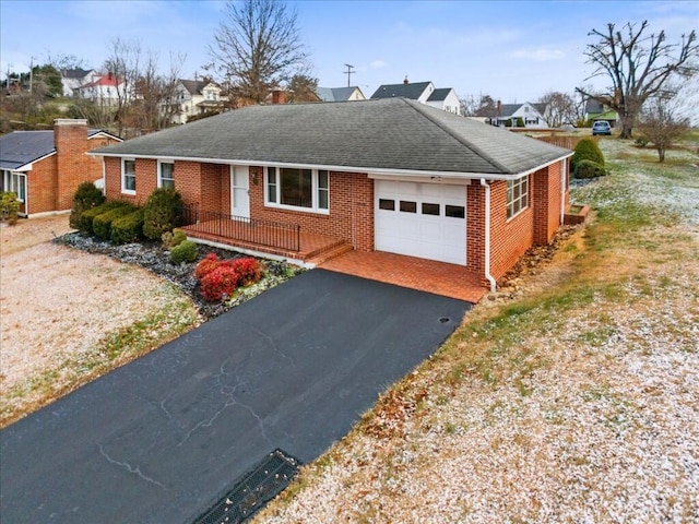 single story home with a garage