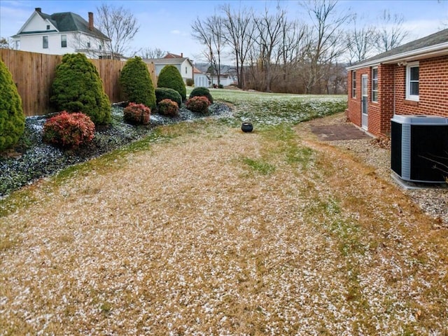 view of yard with central AC