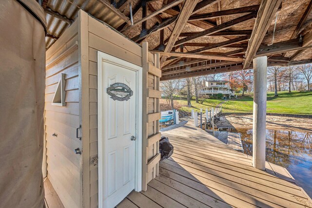 dock area with a water view