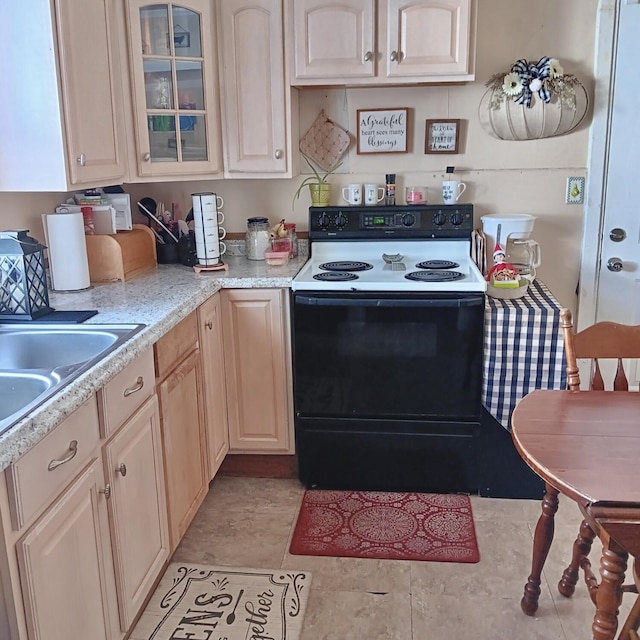 kitchen with black range with electric cooktop