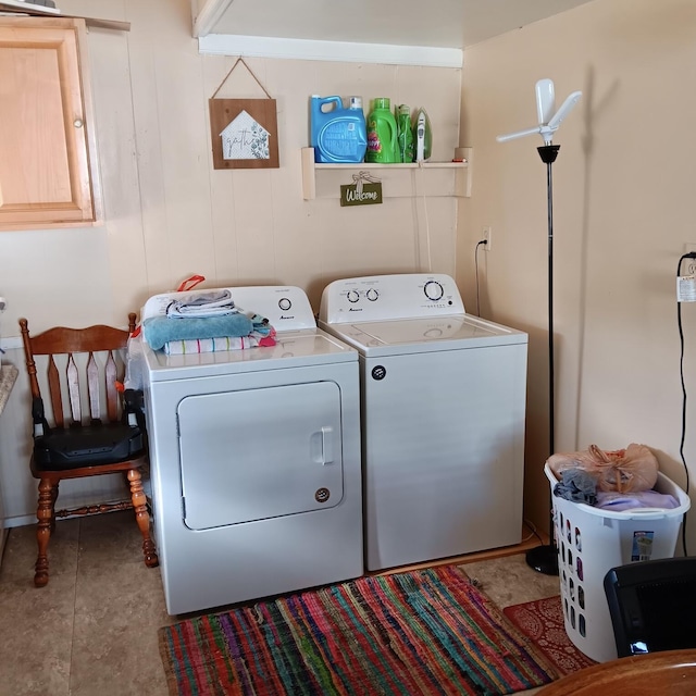 laundry area with separate washer and dryer