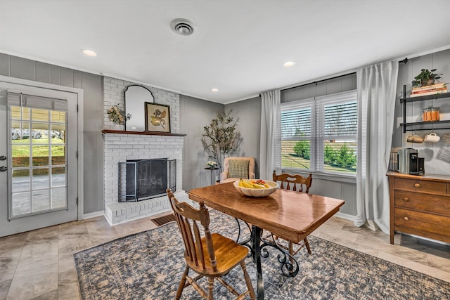 dining area featuring a fireplace