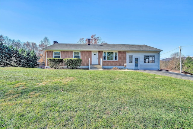 6683 Crowell Gap Rd, Roanoke, VA 24014 - ranch-style home with a chimney, a front yard, and brick siding