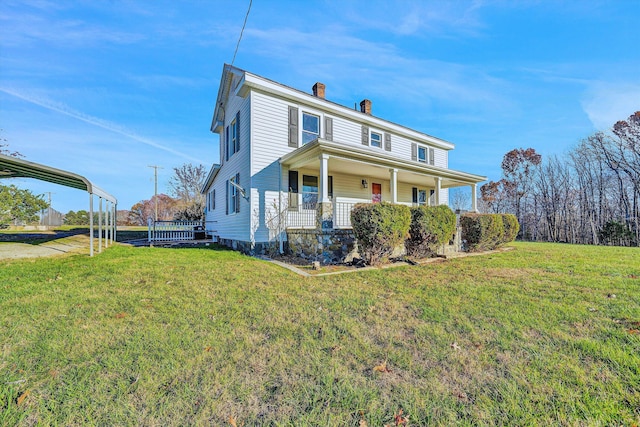 view of front property featuring a carport, covered porch, and a front lawn