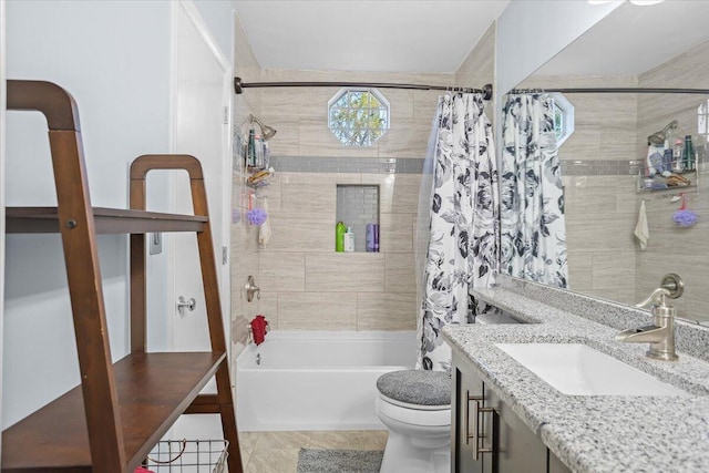 full bathroom with toilet, vanity, tile patterned floors, and shower / bath combination with curtain