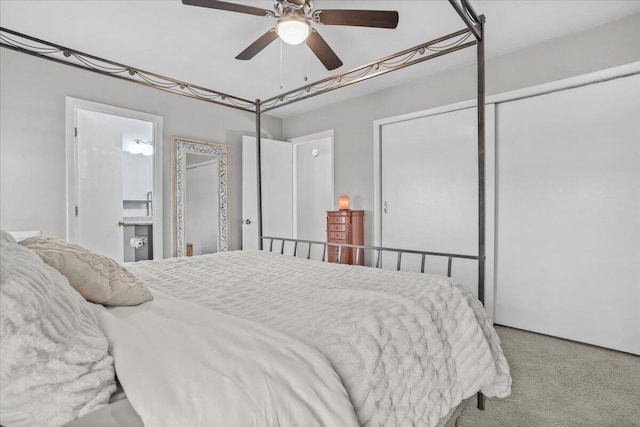 carpeted bedroom featuring ceiling fan