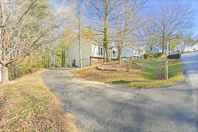 view of property exterior with a garage