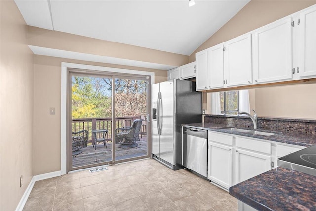 kitchen with sink, white cabinetry, and appliances with stainless steel finishes