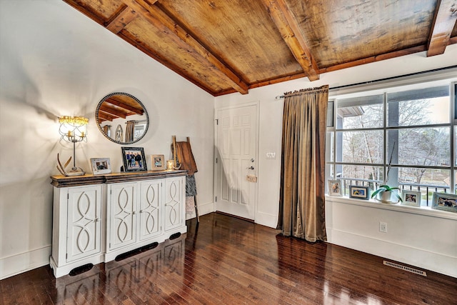 foyer with vaulted ceiling with beams, dark hardwood / wood-style floors, and wood ceiling