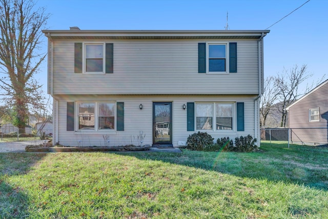 view of front of house featuring a front lawn