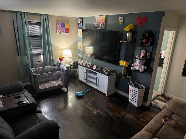 living room featuring dark hardwood / wood-style flooring