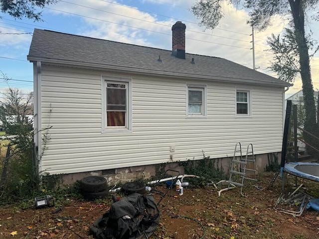 view of home's exterior featuring a trampoline