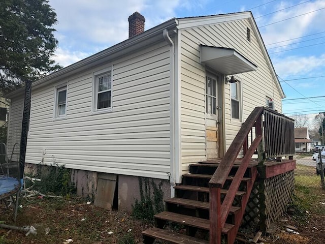 view of side of property featuring a trampoline