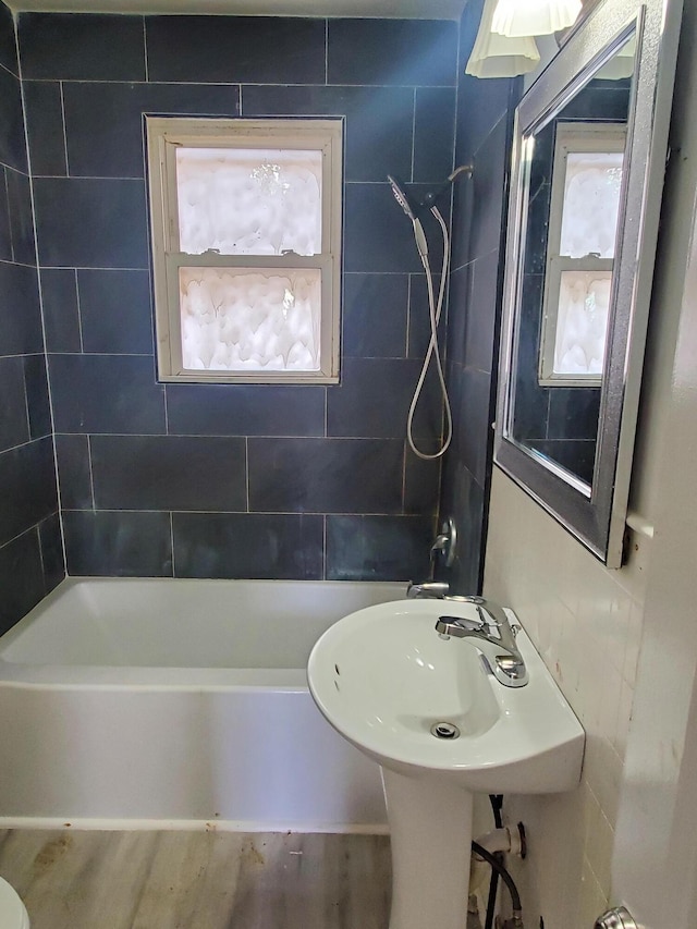 bathroom with washtub / shower combination