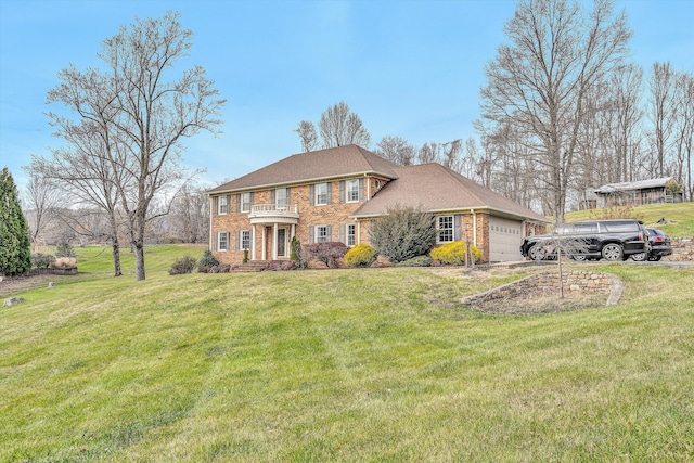 view of front of home with a garage and a front yard