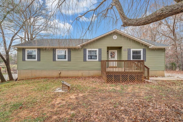 view of front of property featuring a wooden deck