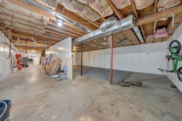 basement featuring gas water heater