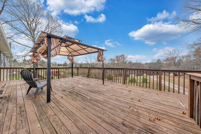 wooden deck with a gazebo