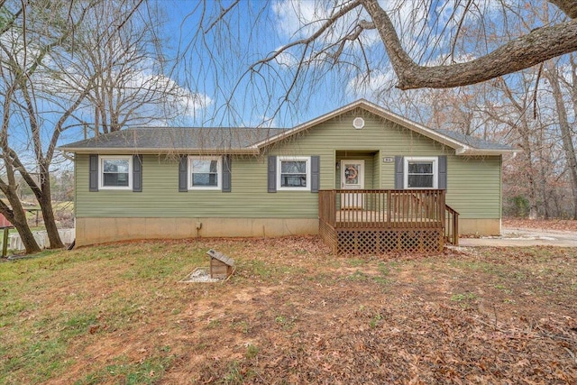 view of front of house with a wooden deck