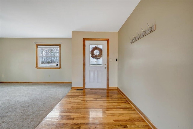 entrance foyer with light hardwood / wood-style floors