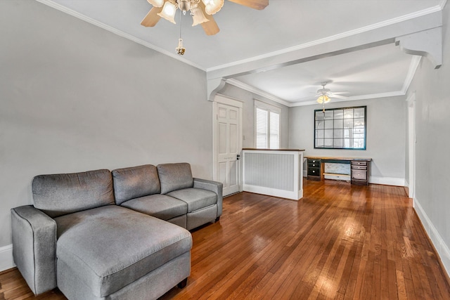 living room featuring ceiling fan, hardwood / wood-style floors, and crown molding