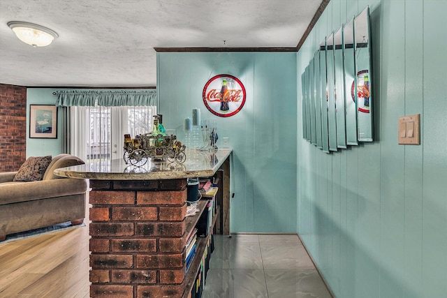 bar with a textured ceiling