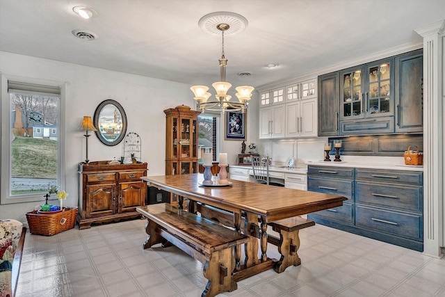 dining area with a chandelier