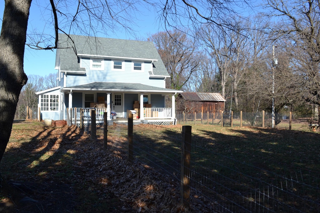 view of front of property featuring covered porch