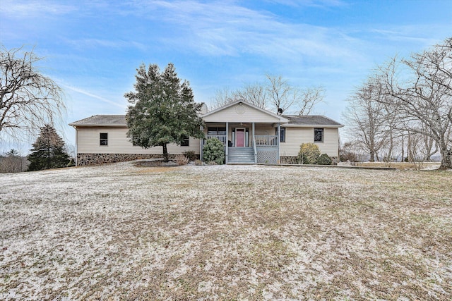 single story home featuring covered porch