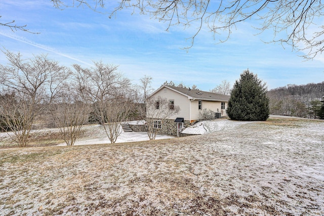 view of snow covered property