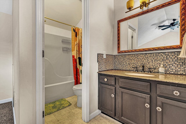 full bathroom with backsplash, vanity, shower / tub combo with curtain, ceiling fan, and toilet