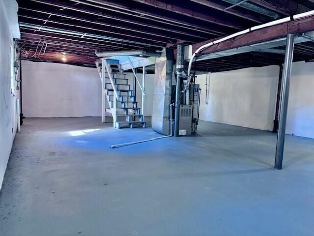 basement featuring heating unit