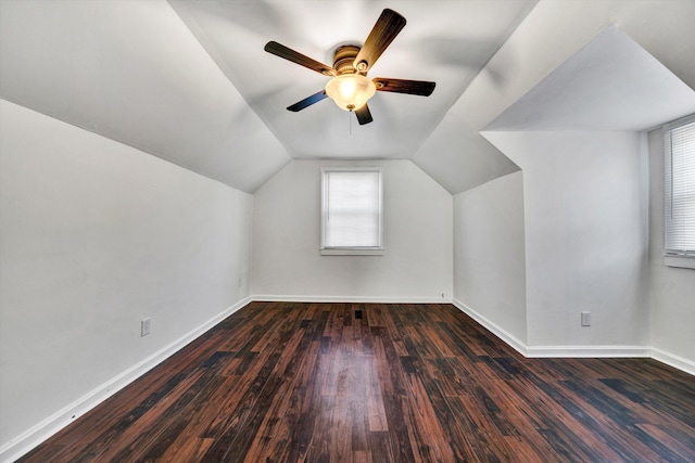 bonus room featuring vaulted ceiling, ceiling fan, and dark hardwood / wood-style floors