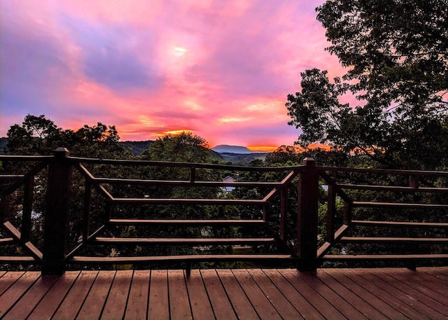 deck at dusk with a mountain view