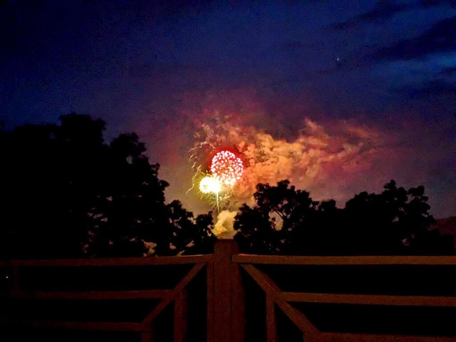 view of gate at dusk