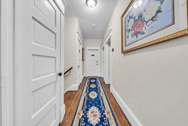 hall featuring dark hardwood / wood-style floors