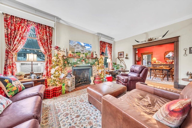 living room with cooling unit and crown molding