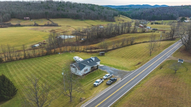 bird's eye view with a mountain view and a rural view